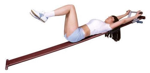 Meaisín aclaíochta le haghaidh cóireáil osteochondrosis sa bhaile